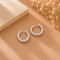 Hilde Twisted Huggie Hoops